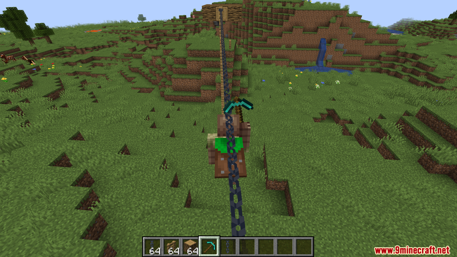 Player sliding down a long chain on a deer mount