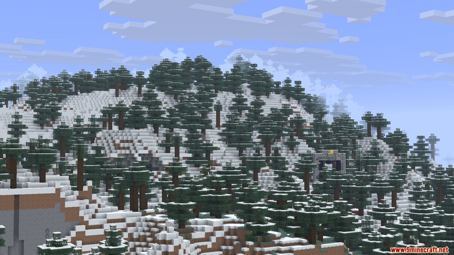 A snowy mountain landscape featuring spruce trees and a ruined nether portal