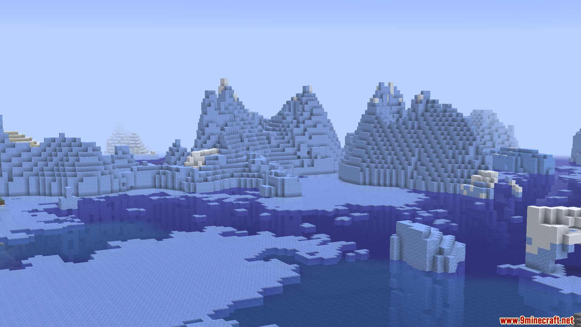 A view of a frozen ocean biome with icebergs in Minecraft