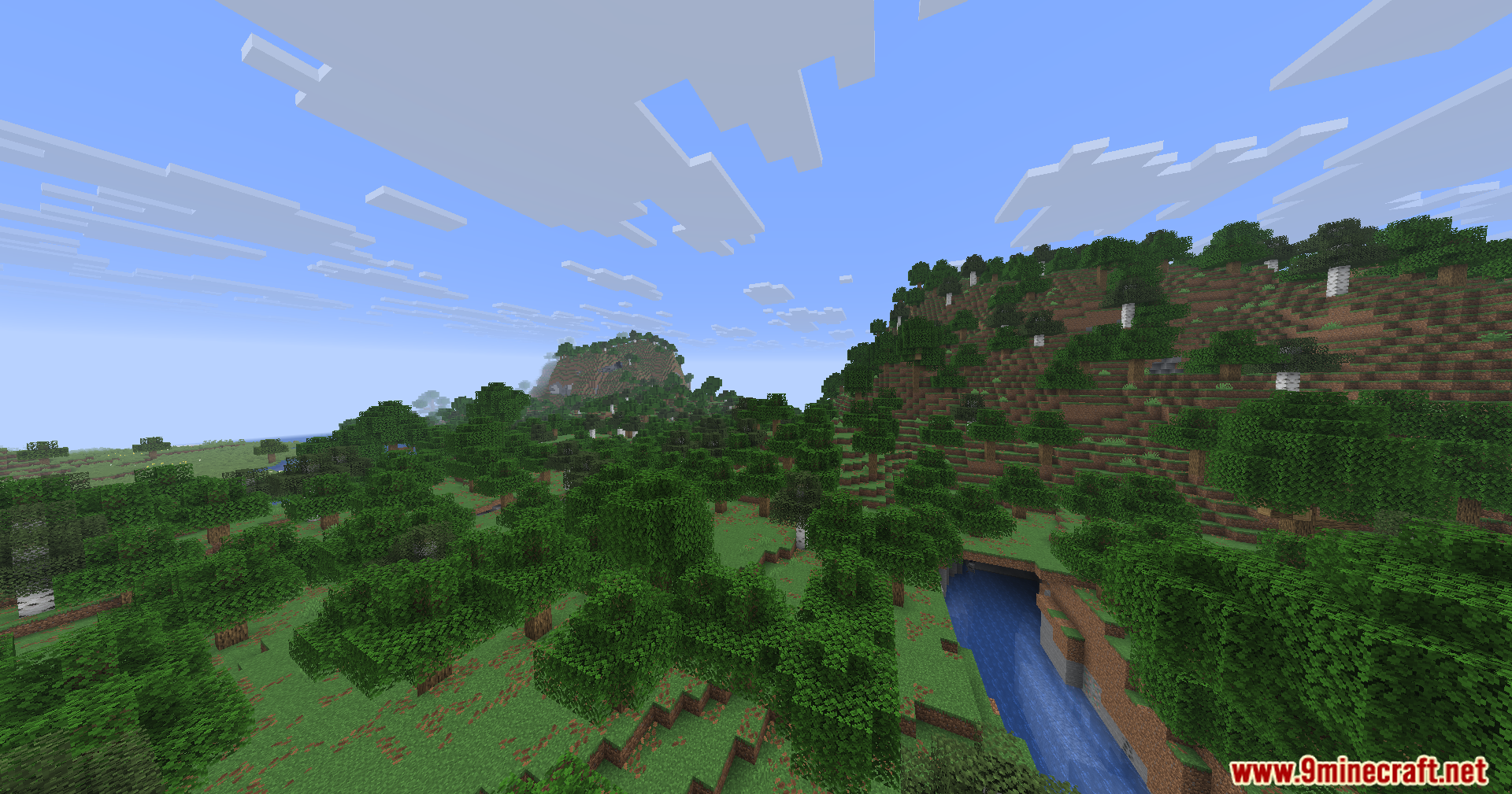 A vast Minecraft world featuring green forests and hills under a clear sky