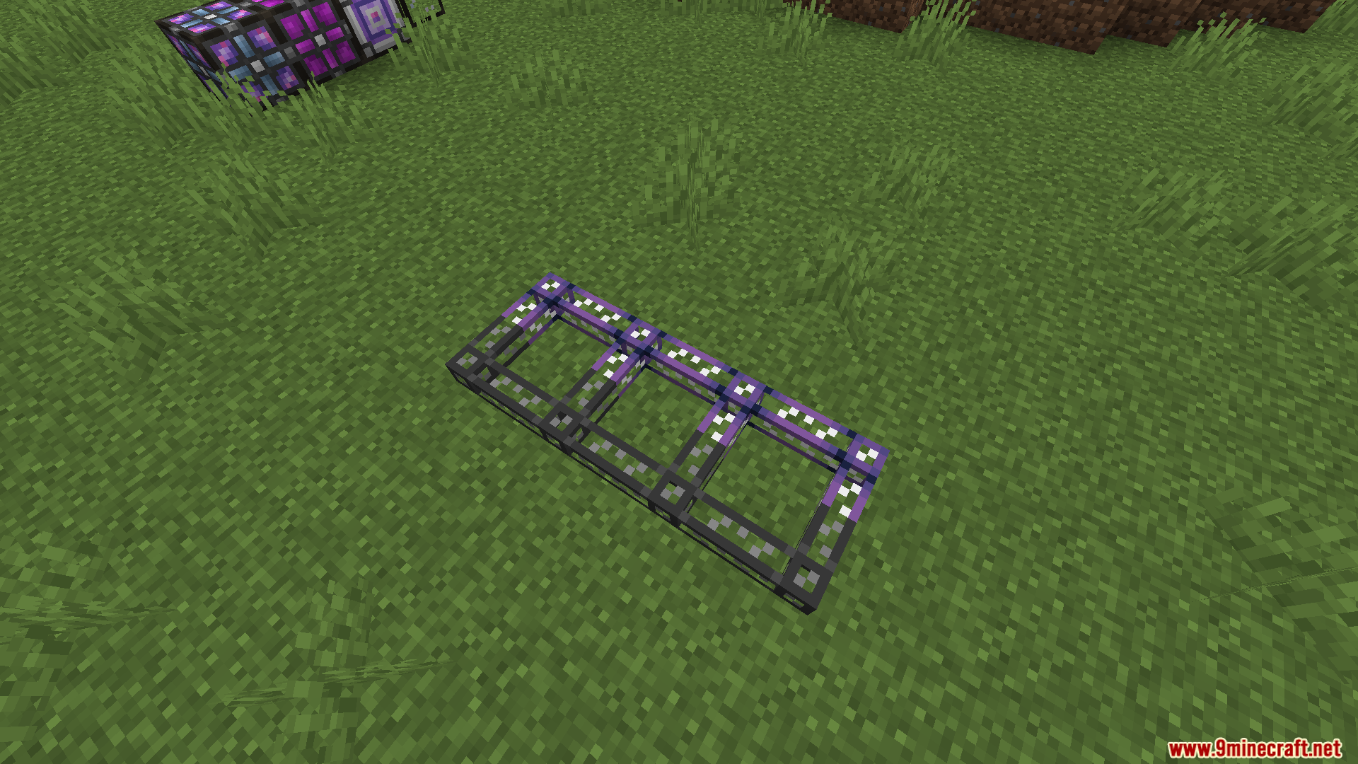 Flat technical wireframe panels with purple highlights resting on the green grass