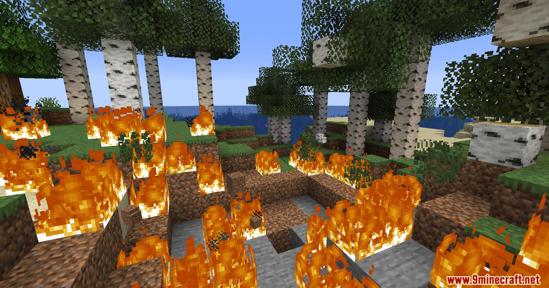 Anchor Optimizer Mod Screenshot 8 The aftermath of an explosion with fire burning in a forest crater