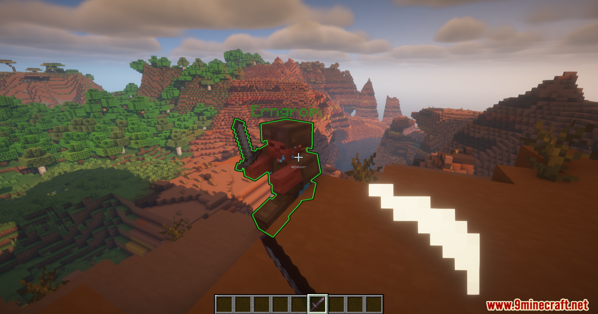 Apothic Compats Mod Screenshot 4 A player with a green outline stands on a cliff in Minecraft