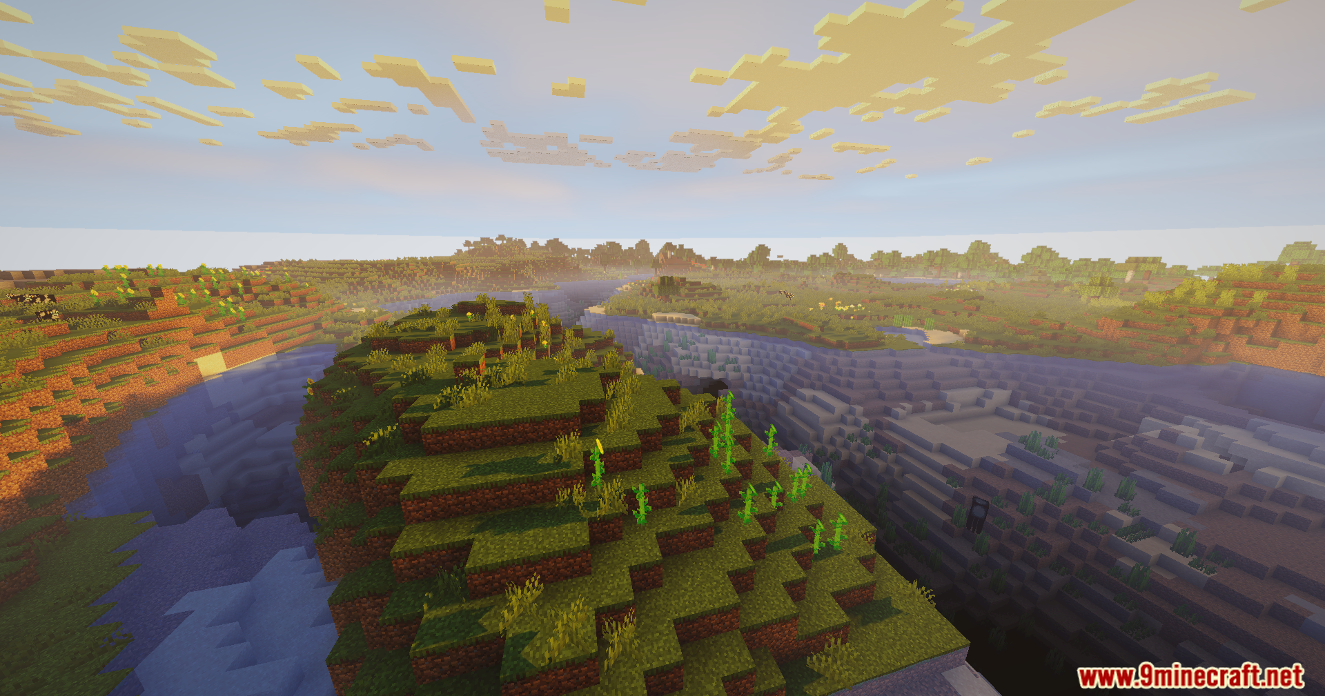 AuraLite Shaders showcase realistic lighting and volumetric clouds over a winding river