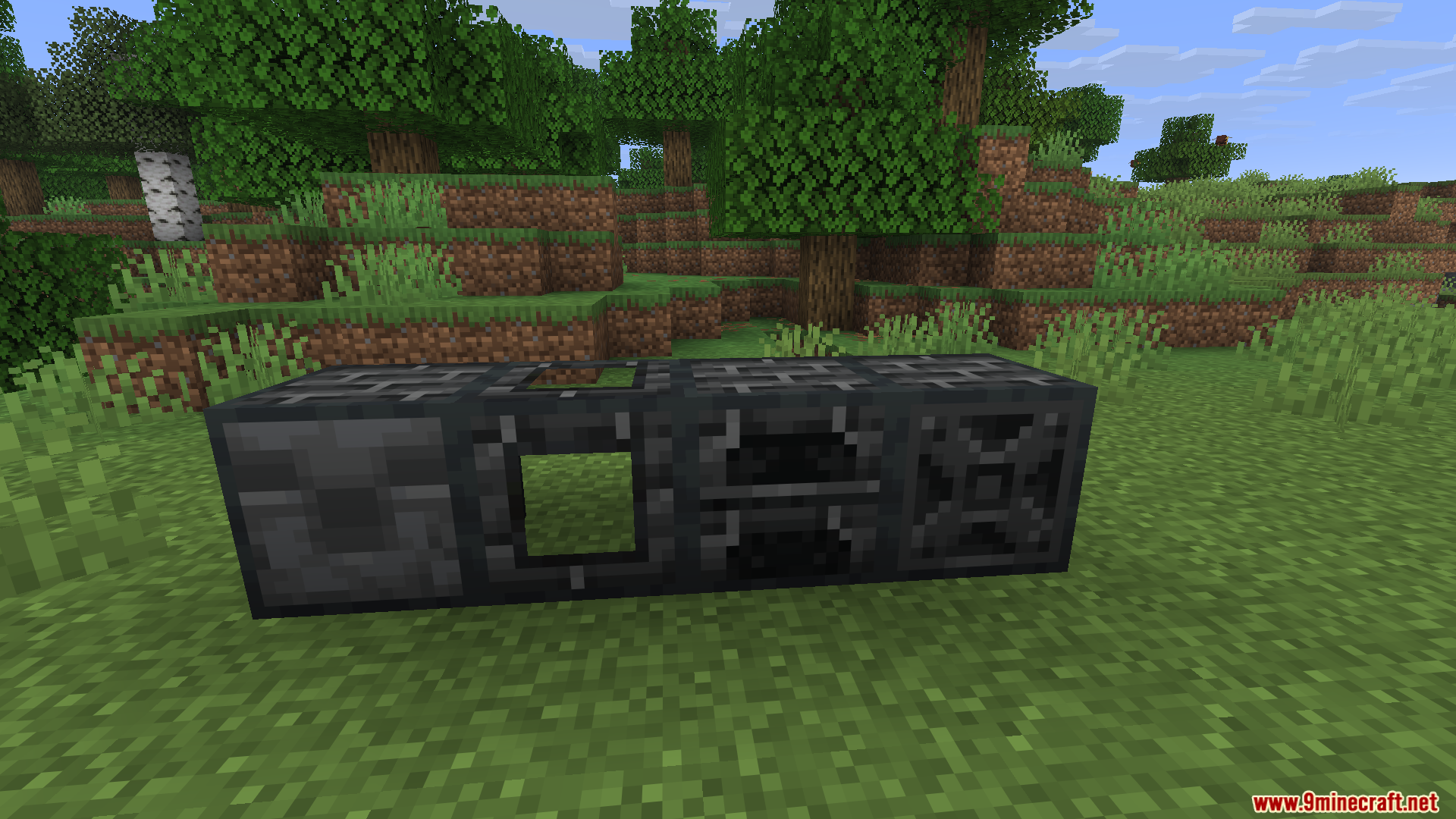 Several dark gray processing machines from BBL Casting Mod placed on grass