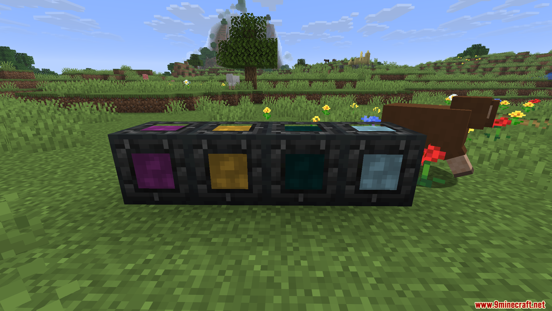 Four dark industrial blocks with glowing colored centers from BBL Casting Mod