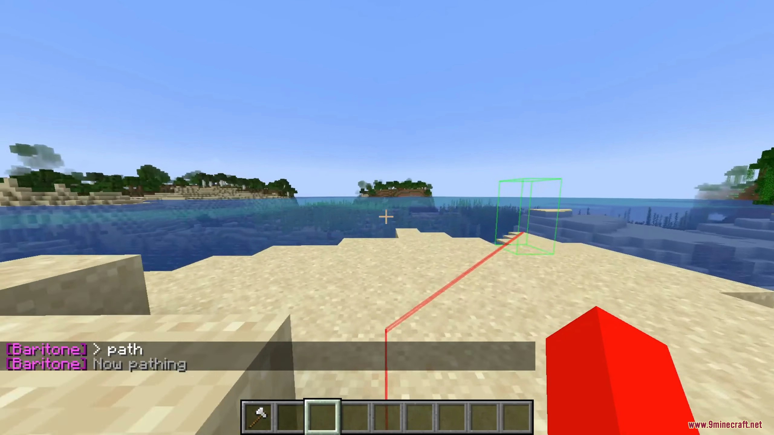 A red pathfinding line guides the player toward the designated goal block.