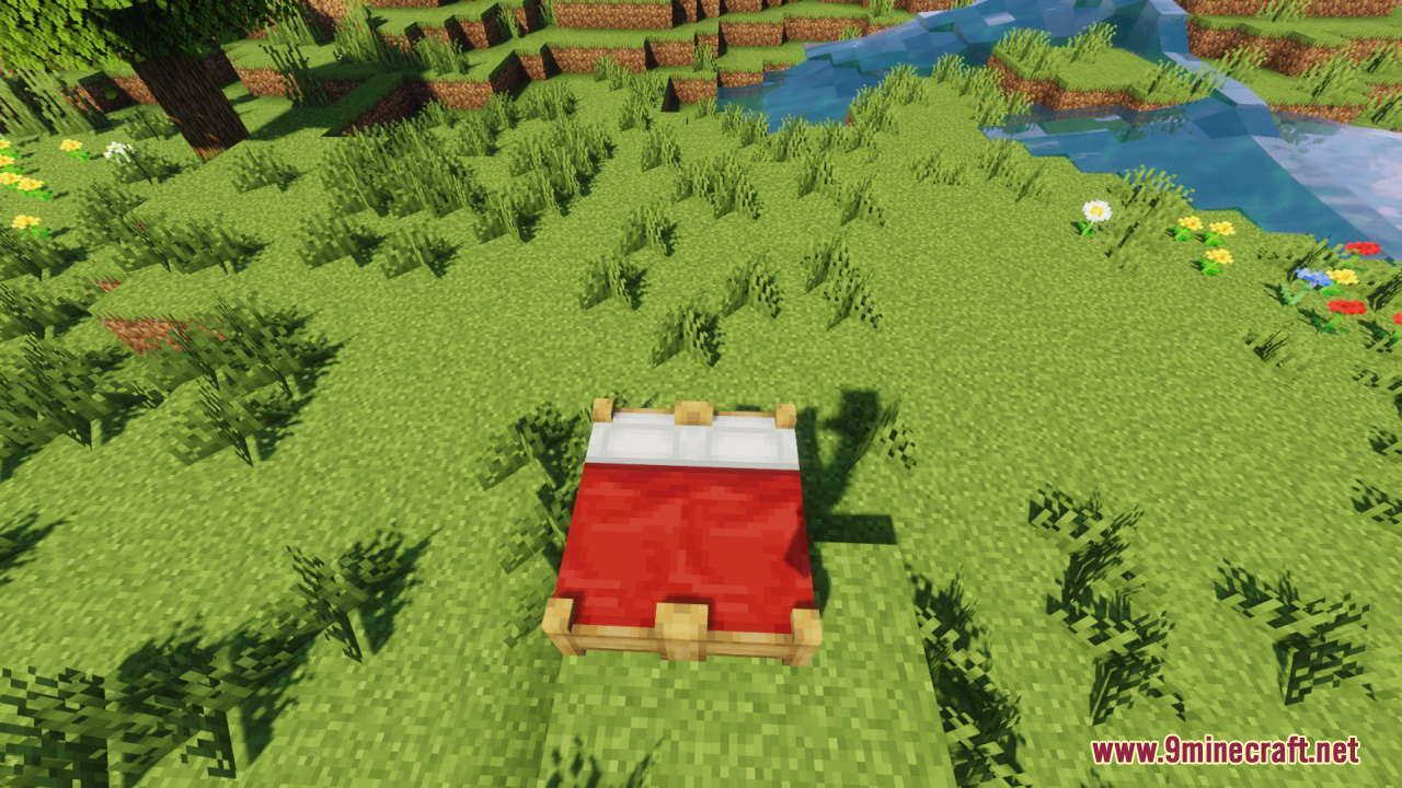Bee's Cozier Beds Resource Pack Screenshot 11 A red double bed with a wooden frame placed on green grass