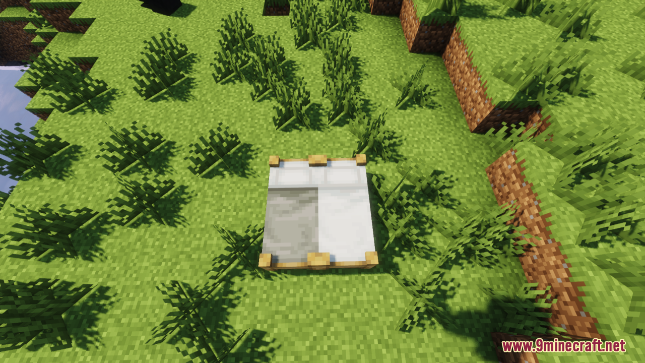 Bee's Cozier Beds Resource Pack Screenshot 4 Gray and white double bed with a detailed wooden frame near bushes