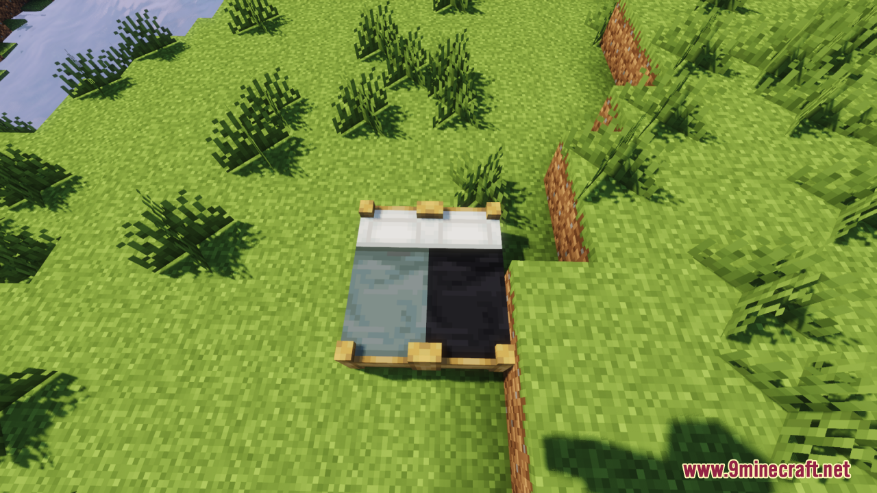 Bee's Cozier Beds Resource Pack Screenshot 5 Cozy light blue and black beds with detailed wooden frames on grass