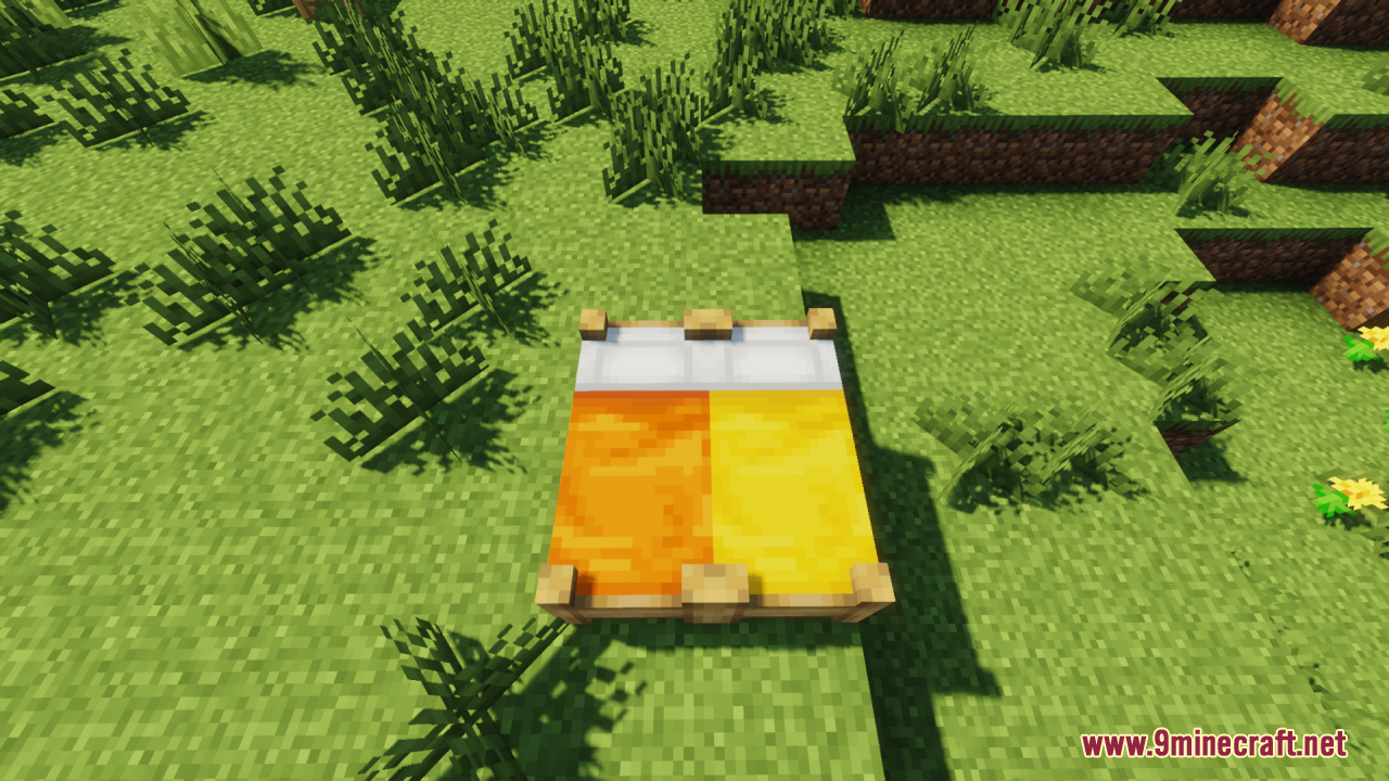 Bee's Cozier Beds Resource Pack Screenshot 7 Orange and yellow double bed with a wooden frame in a grassy field