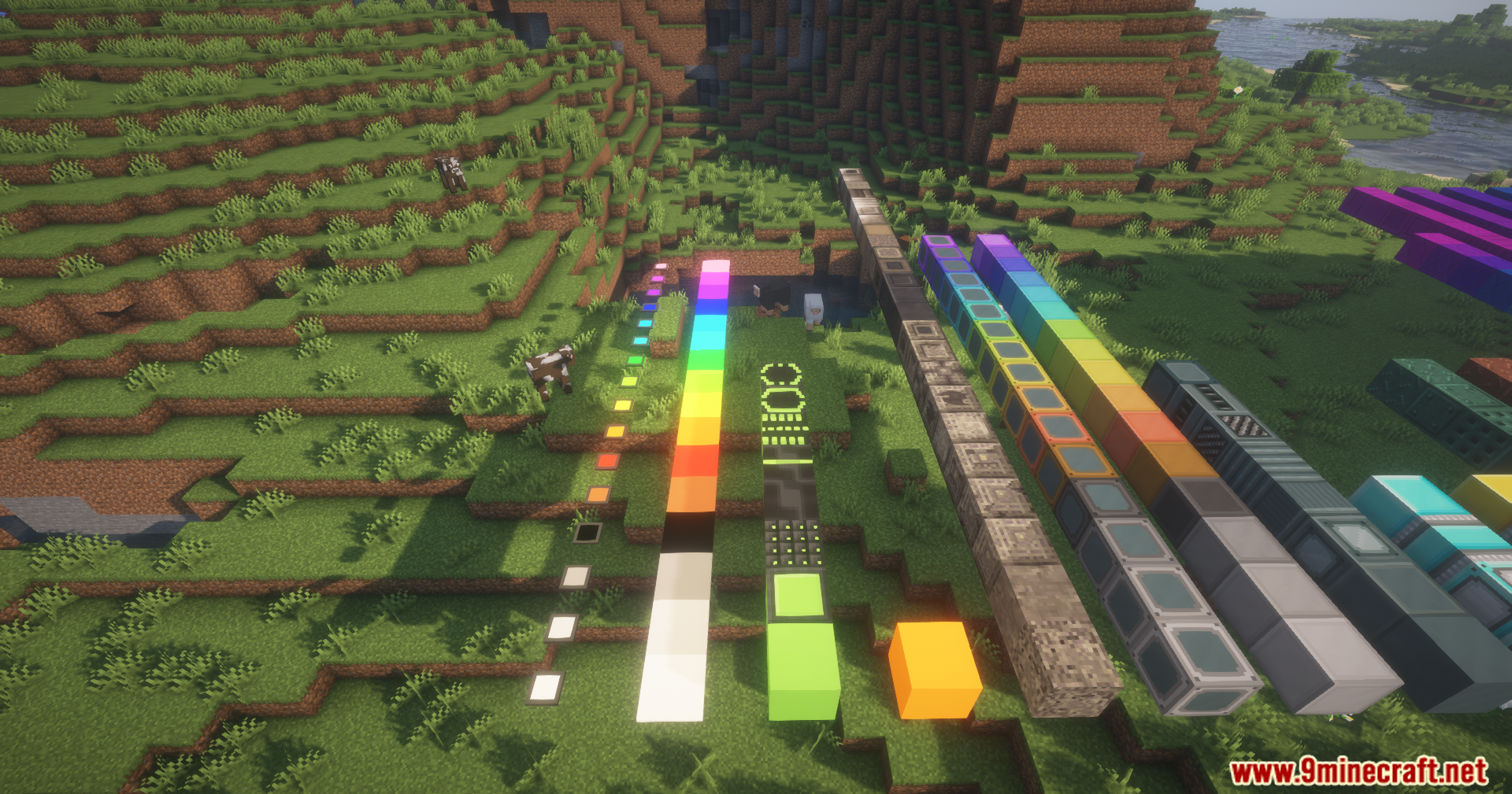 Better Blockz Mod Screenshot 15 Various colorful neon and industrial blocks from Better Blockz Mod on a hill