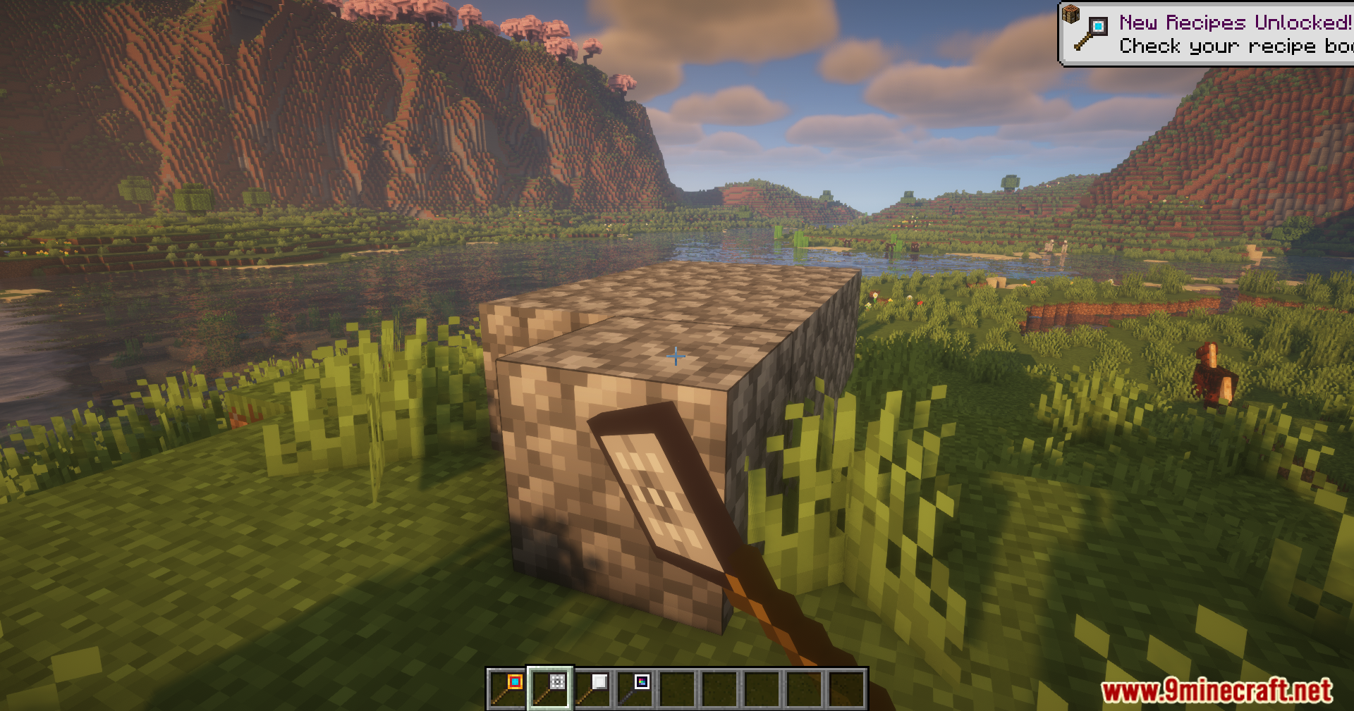 Better Blockz Mod Screenshot 3 A player uses a Better Blockz tool to modify cobblestone blocks outdoors