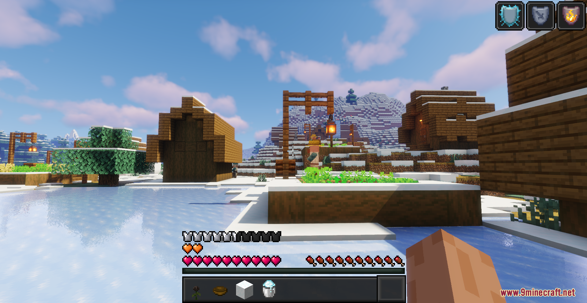 Beyond Huds Resource Pack Screenshot 10 A snowy village in Minecraft with a dark themed custom hotbar interface