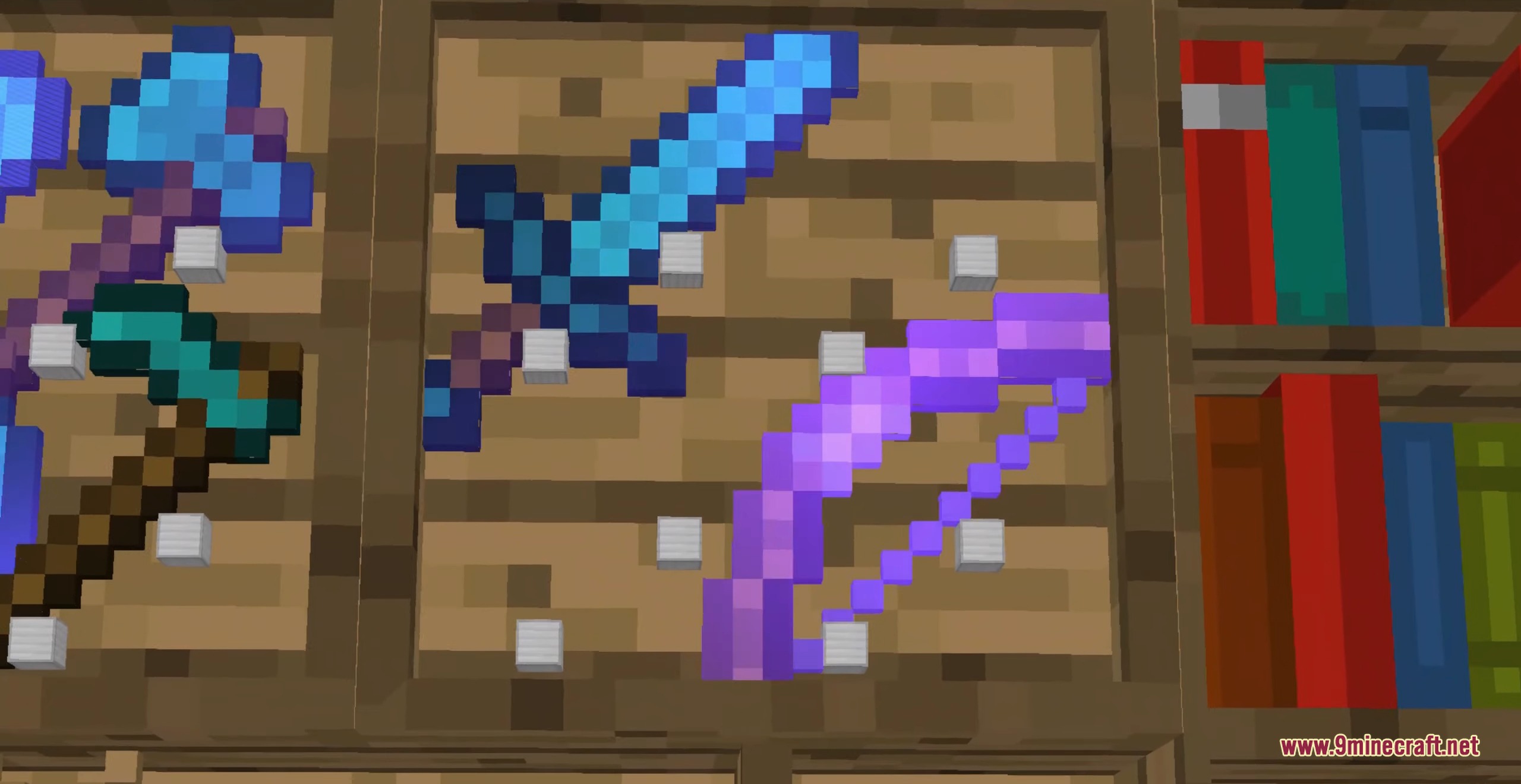 Diamond tools and a purple bow displayed on a wooden tool rack