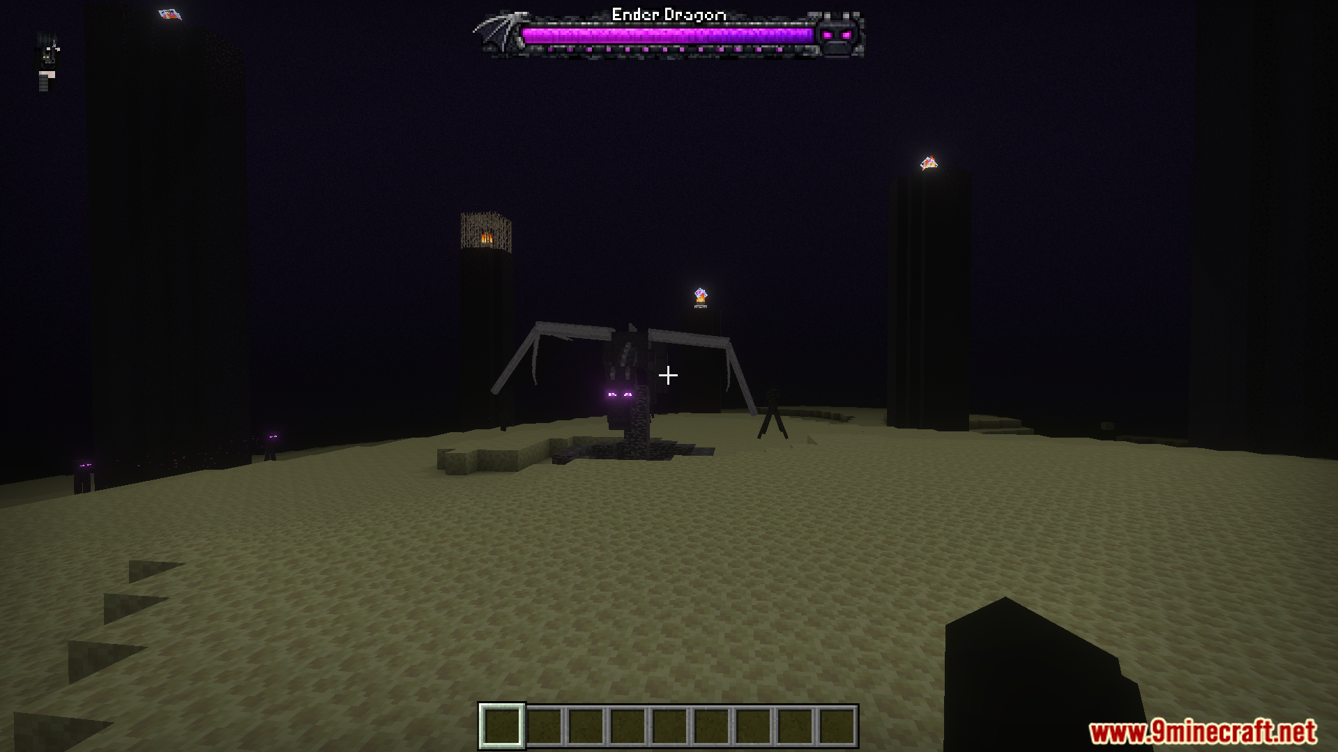Ender Dragon perched on the exit portal showing a sleek purple health bar