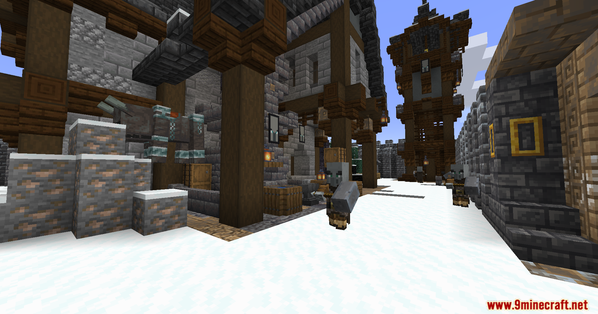Vindicators patrolling a snowy courtyard near a tall stone and wood tower