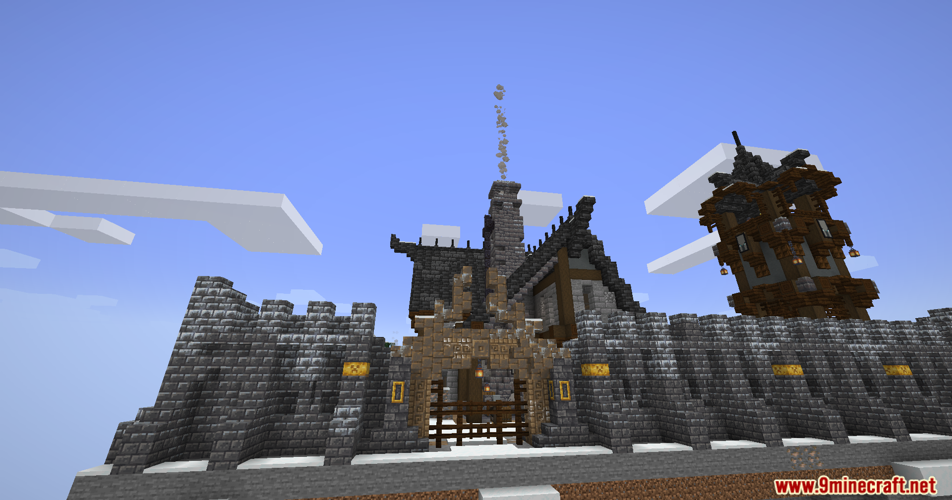 A large stone wall and wooden tower guarding a snowy outpost