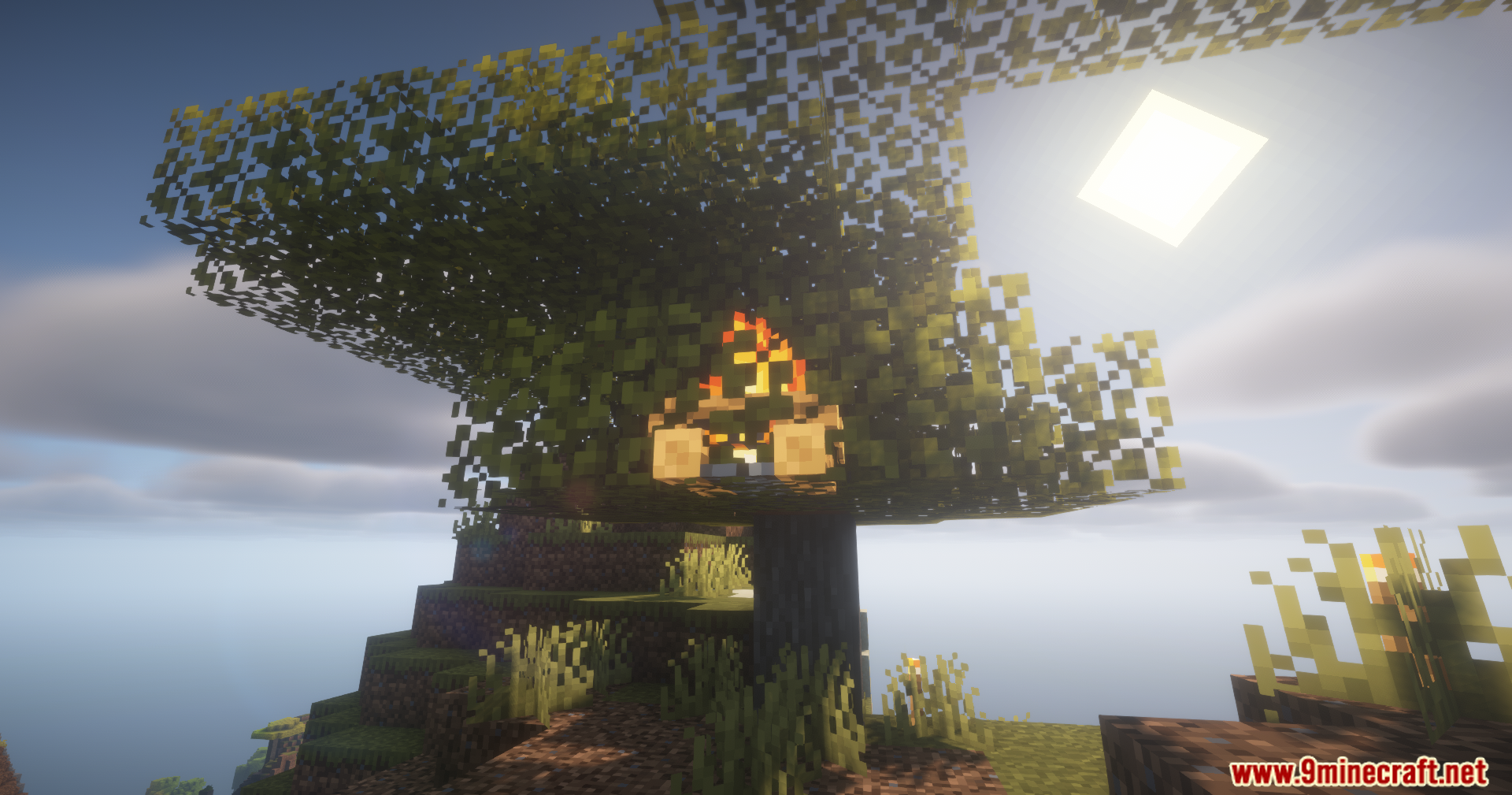 A campfire block placed inside tree leaves using the Camol Mod