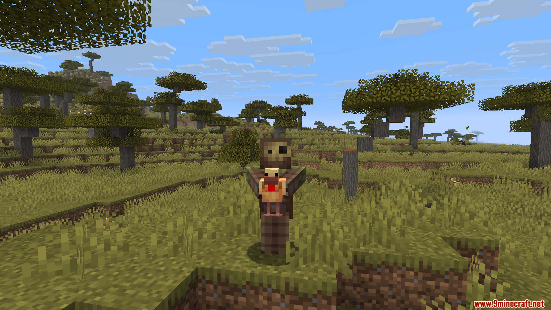 Carry Me Mod Screenshot 6 A player character holding a small chicken in a savanna biome environment
