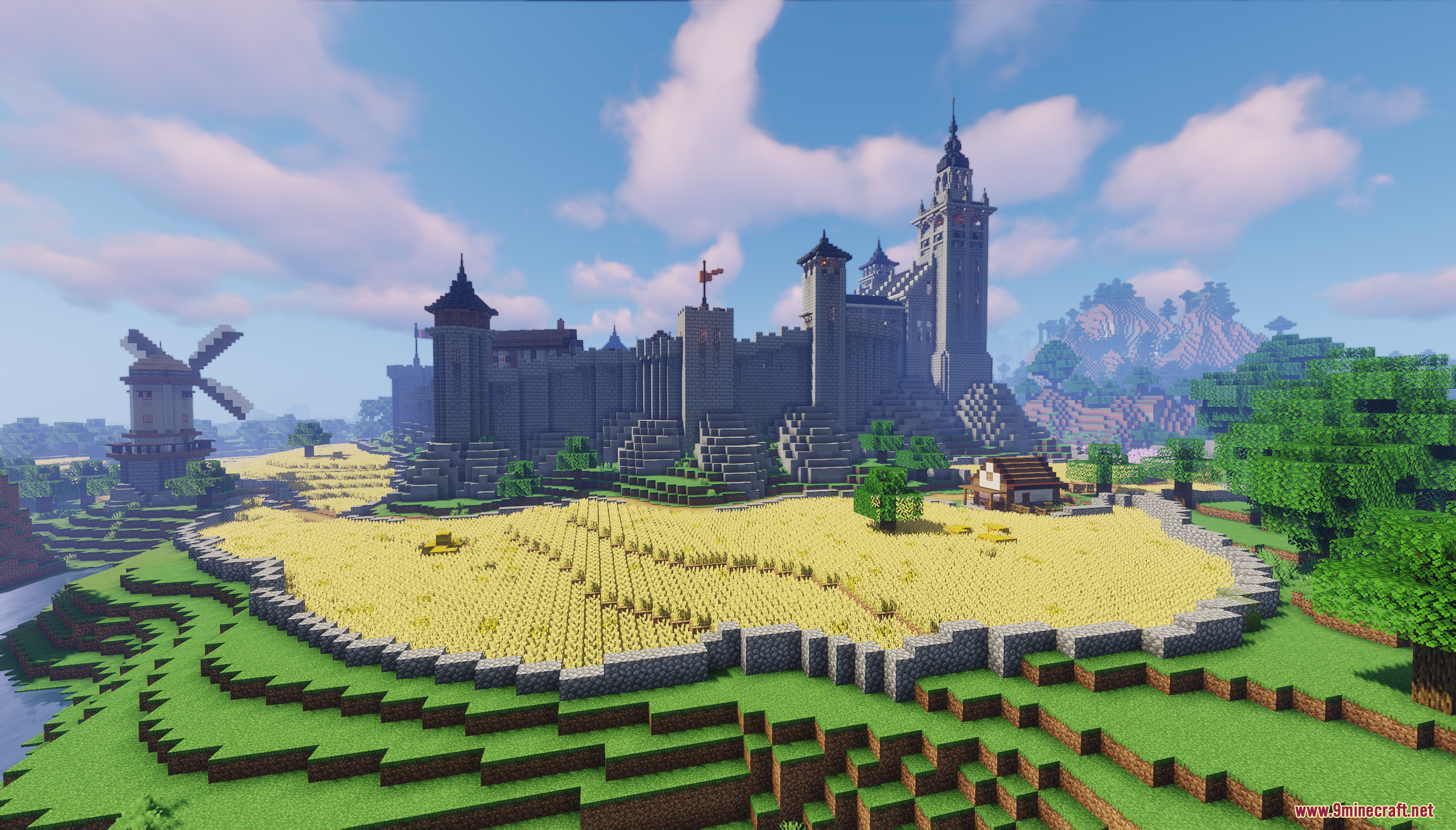Castle Town Map Screenshot 8 Wide view of a medieval castle with a windmill and wheat fields