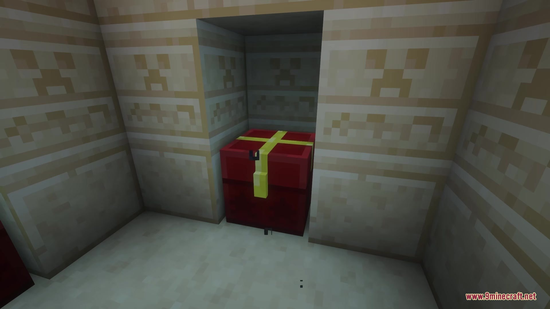 Clavis Mod Screenshot 7 A red gift wrapped loot chest sits inside a sandstone structure alcove