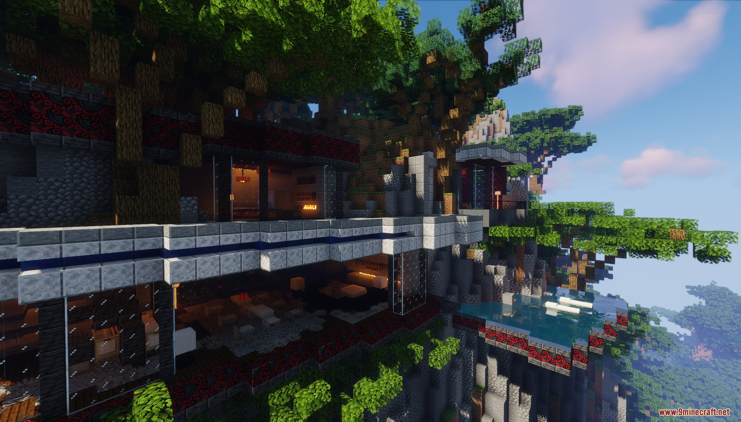 Modern mansion built into a cliff with glass walls and a balcony pool