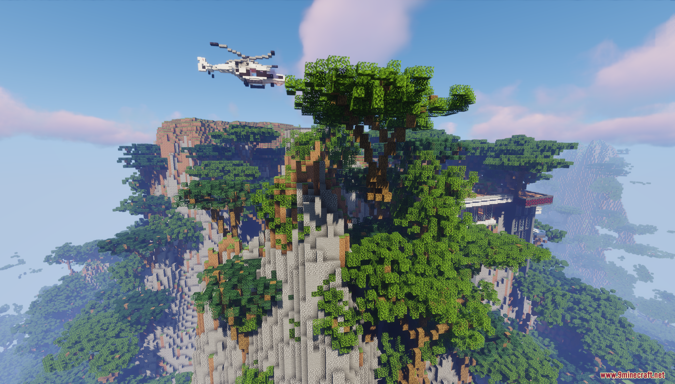 White helicopter flying near a modern mansion built on a high mountain cliff
