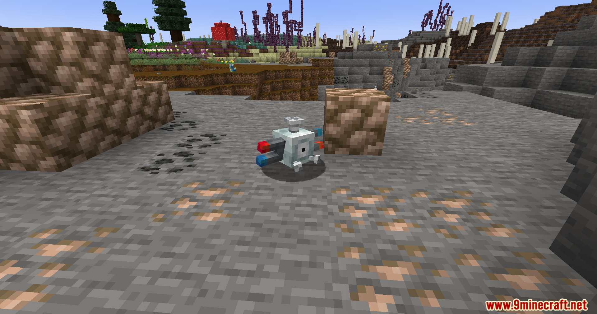 Cobble Safari Mod Screenshot 11 Magnemite hovers near stone blocks and ore in a mountainous Cobblemon world