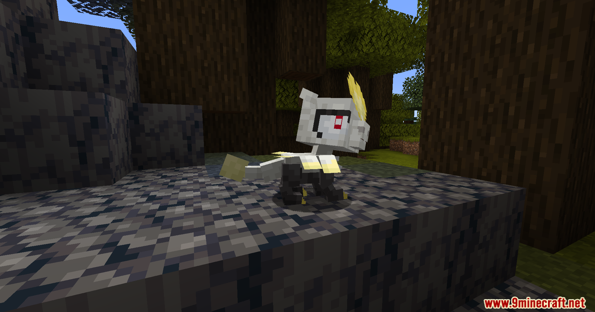 Cobble Safari Mod Screenshot 16 A grey Jangmo o creature stands on dark stone blocks near trees