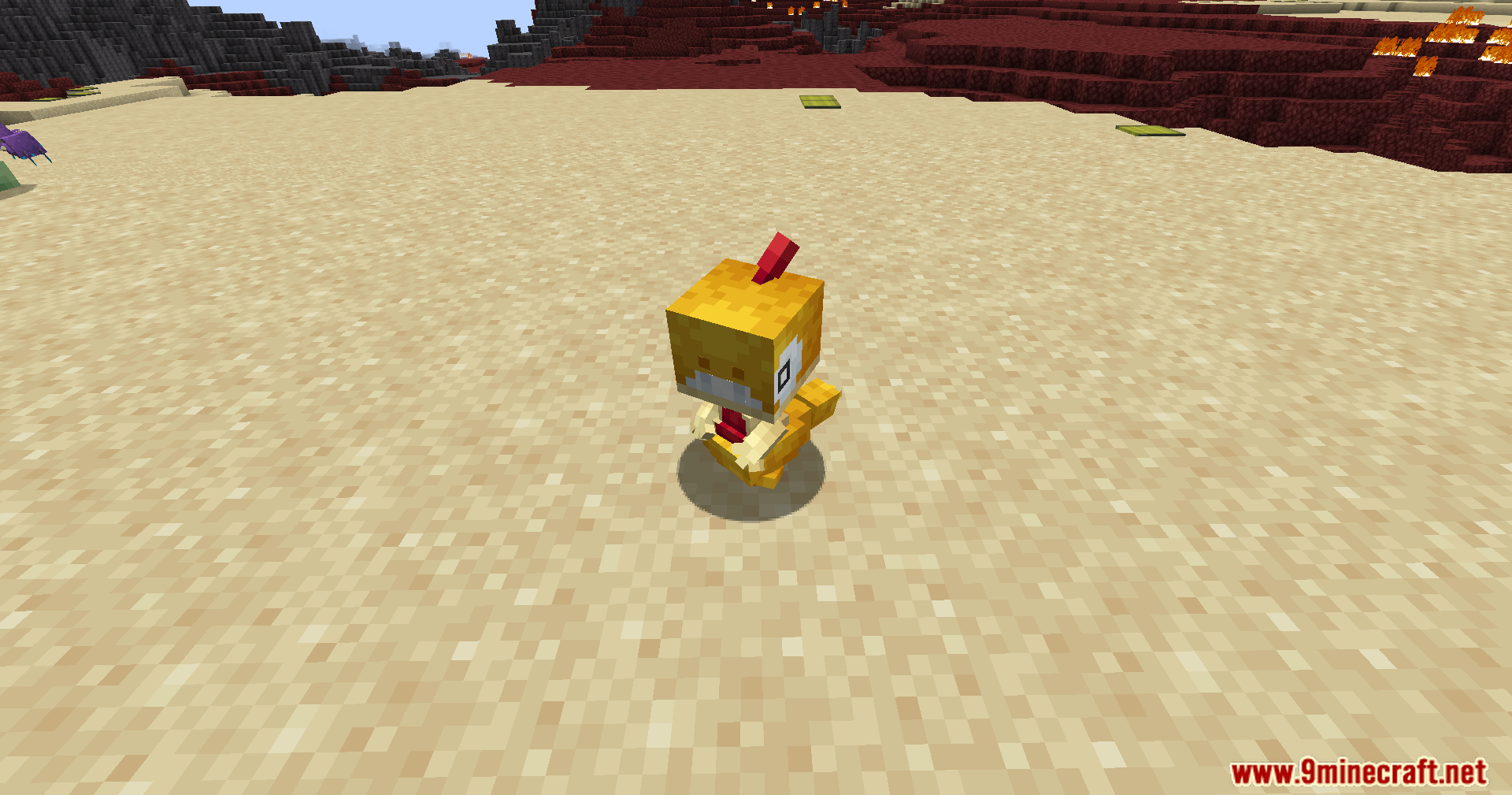 Cobble Safari Mod Screenshot 19 A small yellow Torchic stands on a sandy plain in Minecraft