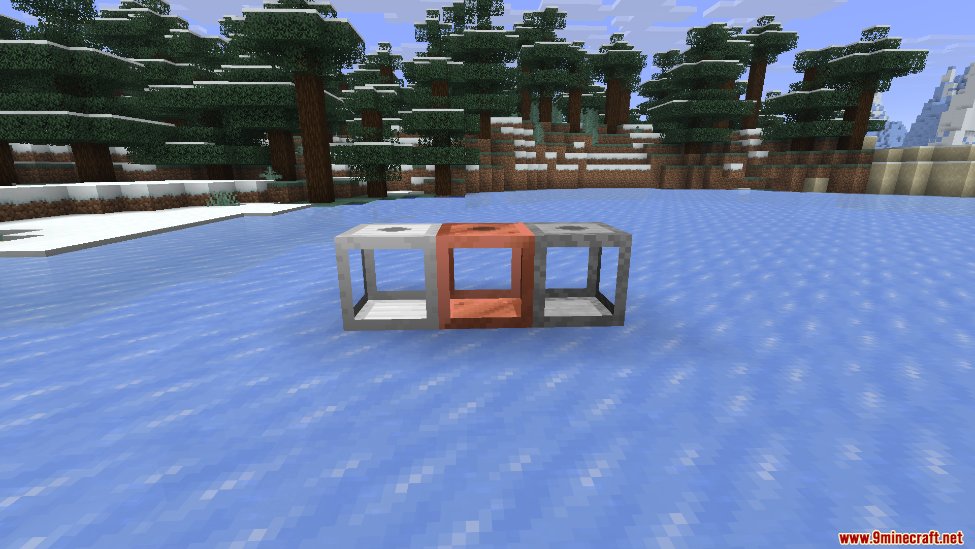 Cobblegen Galore Mod Screenshot 5 Three hollow generator blocks placed on a frozen lake in a snowy forest