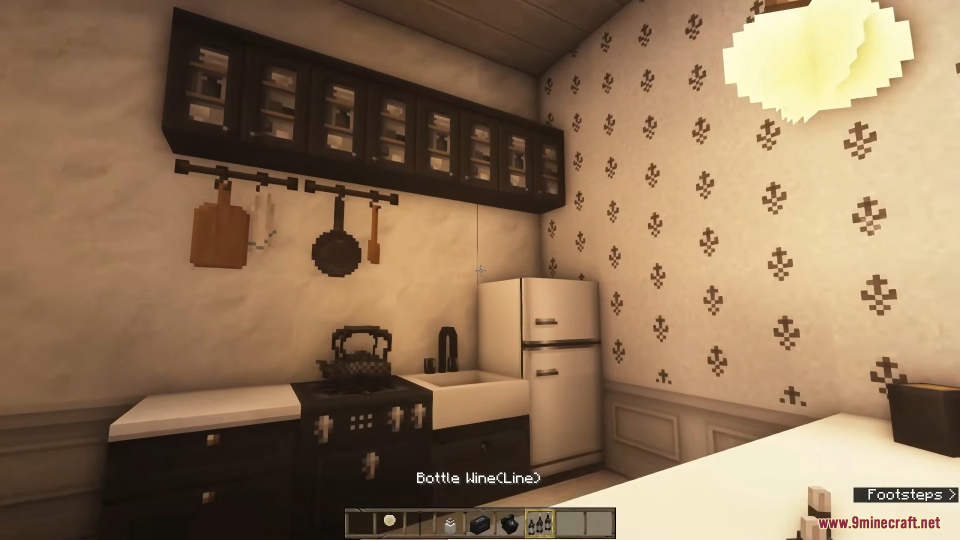 A detailed kitchen counter with a black stove, sink, and white refrigerator