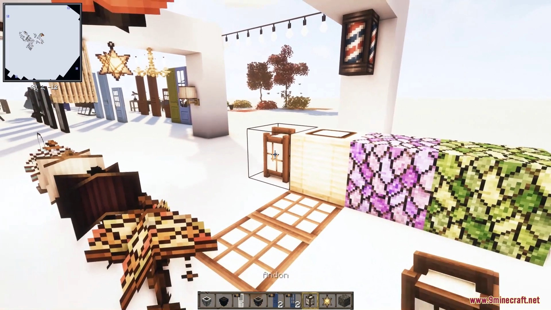 Cozy paper lanterns, string lights, and colorful patterned blocks create a warm atmosphere.