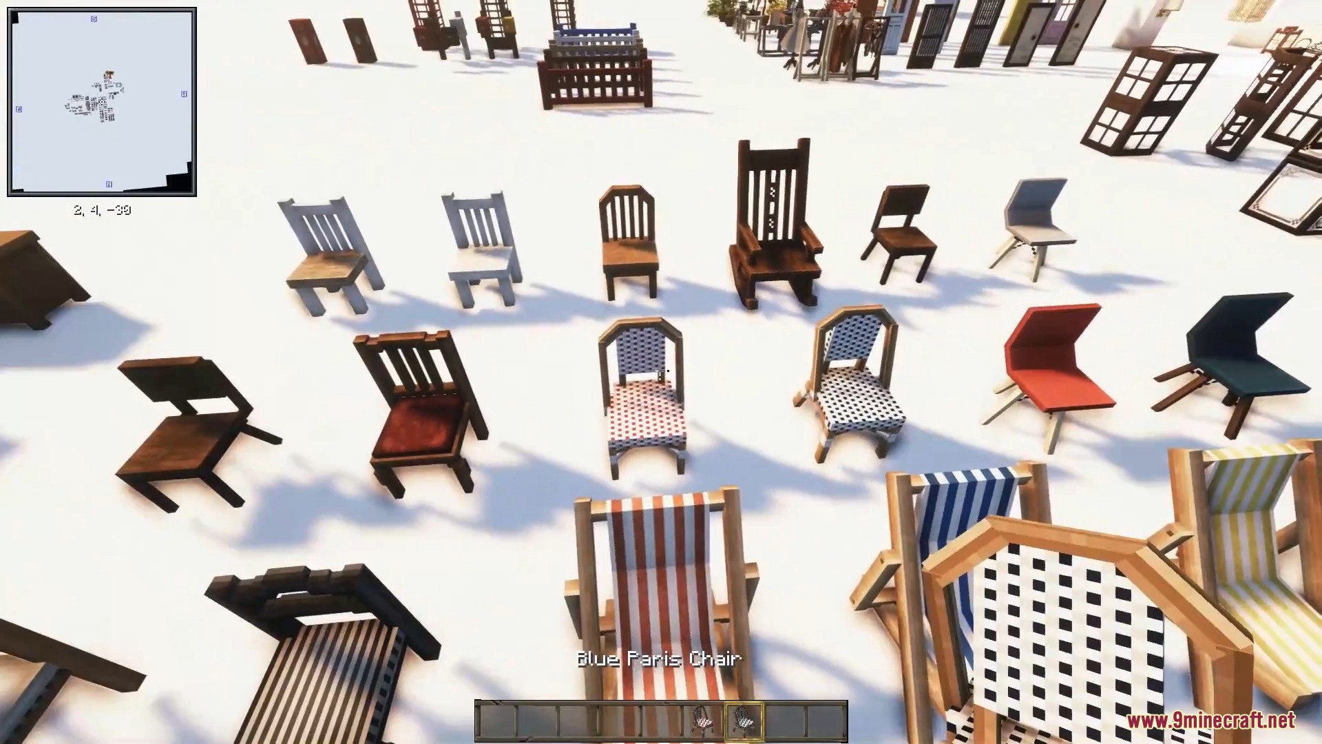 An assortment of wooden chairs, striped beach loungers, and patterned stools.