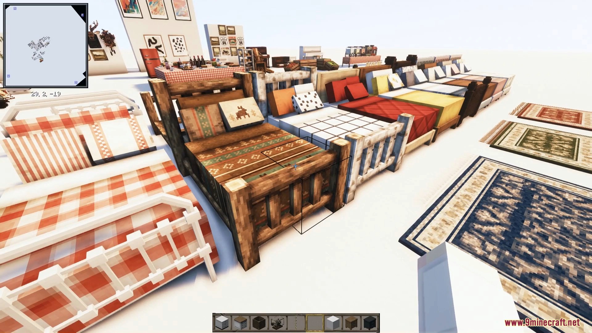 Cozy beds with patterned blankets and pillows lined up next to decorative rugs.