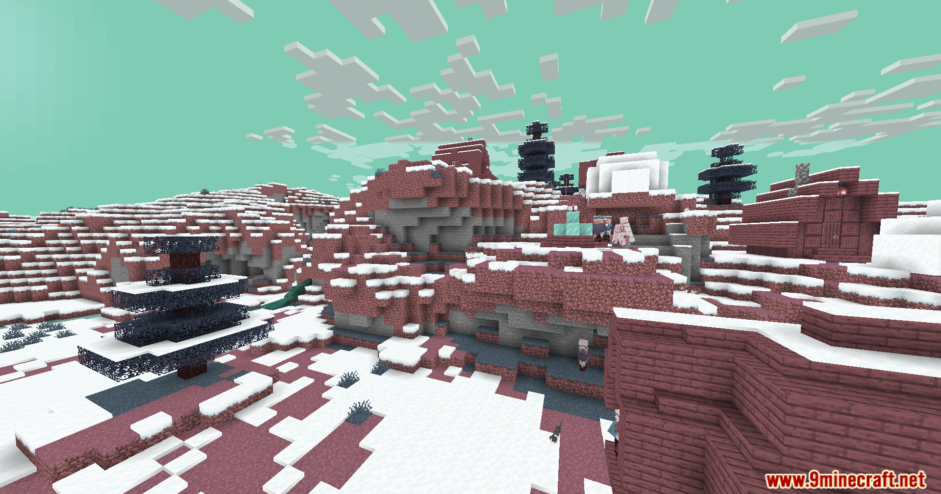 Reddish pink terrain and dark trees covered in snow under teal clouds