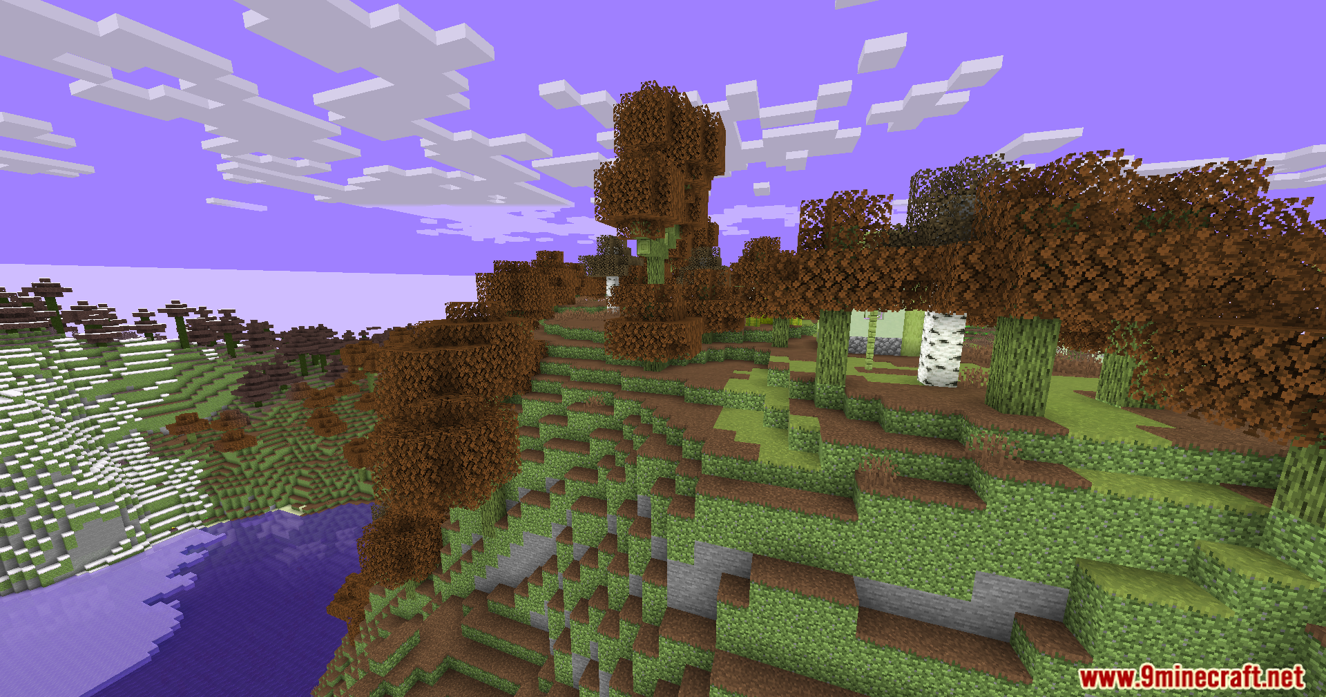 Minecraft landscape featuring a purple sky and brown trees on a grassy hill