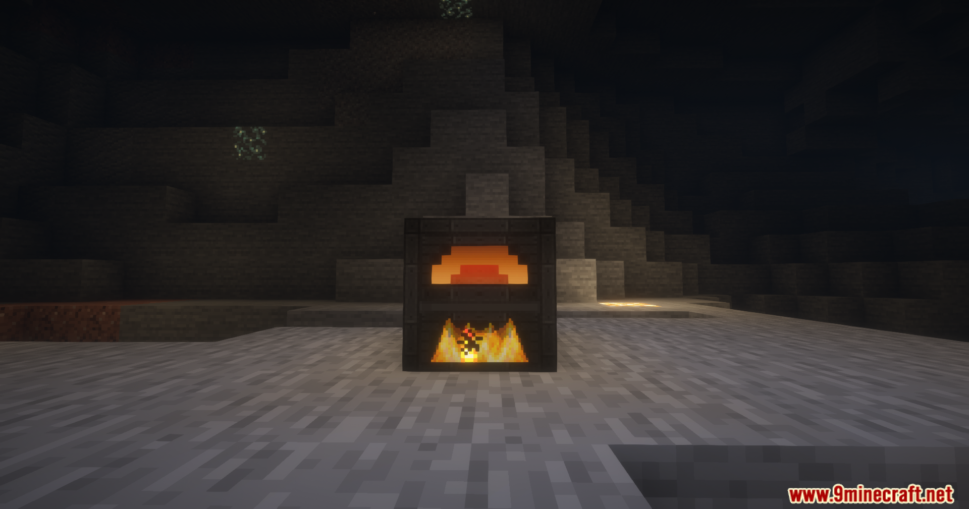 Front view of a burning furnace factory block in a dark cave