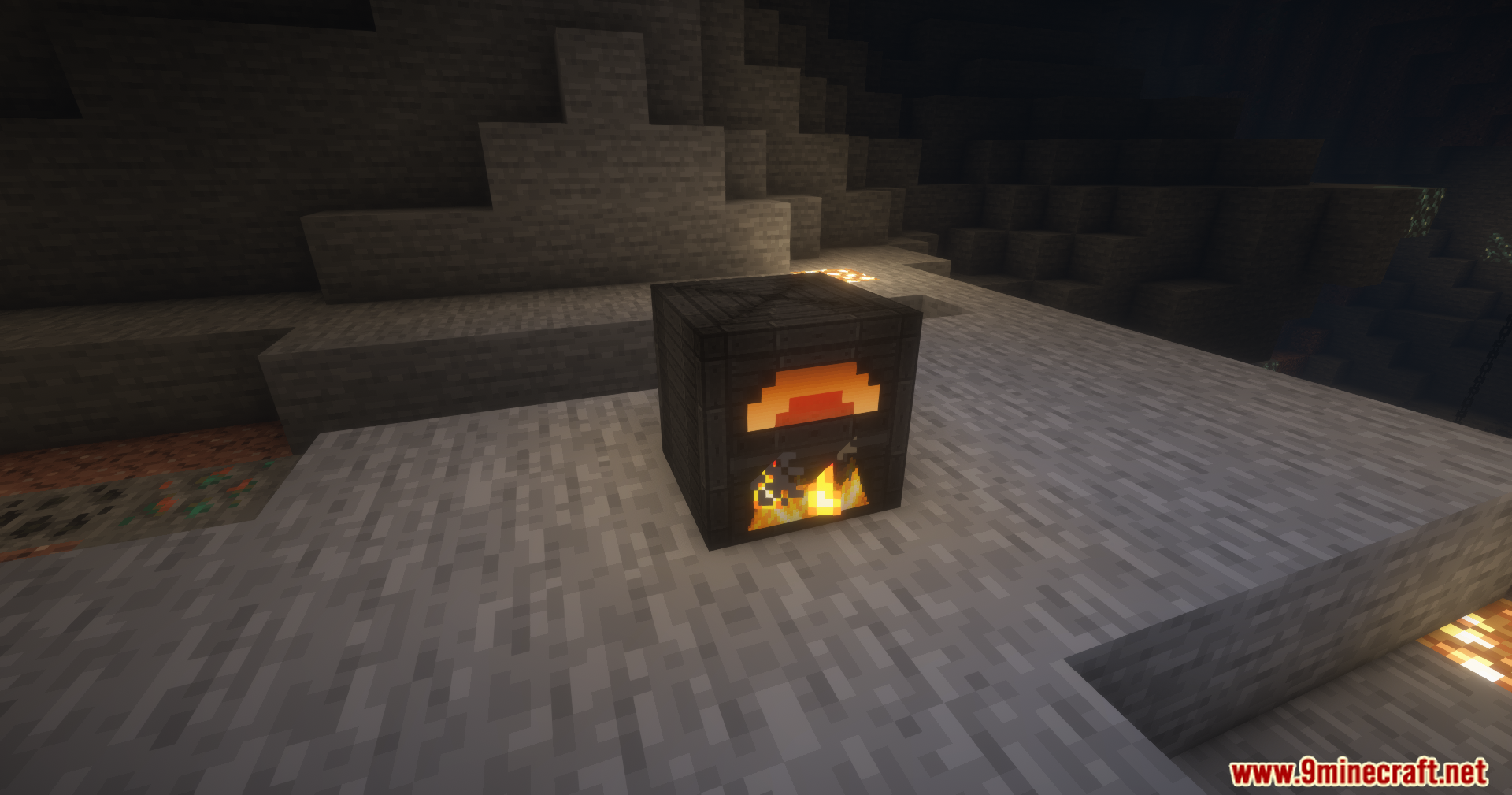 A dark furnace block with a glowing orange face placed inside a cave