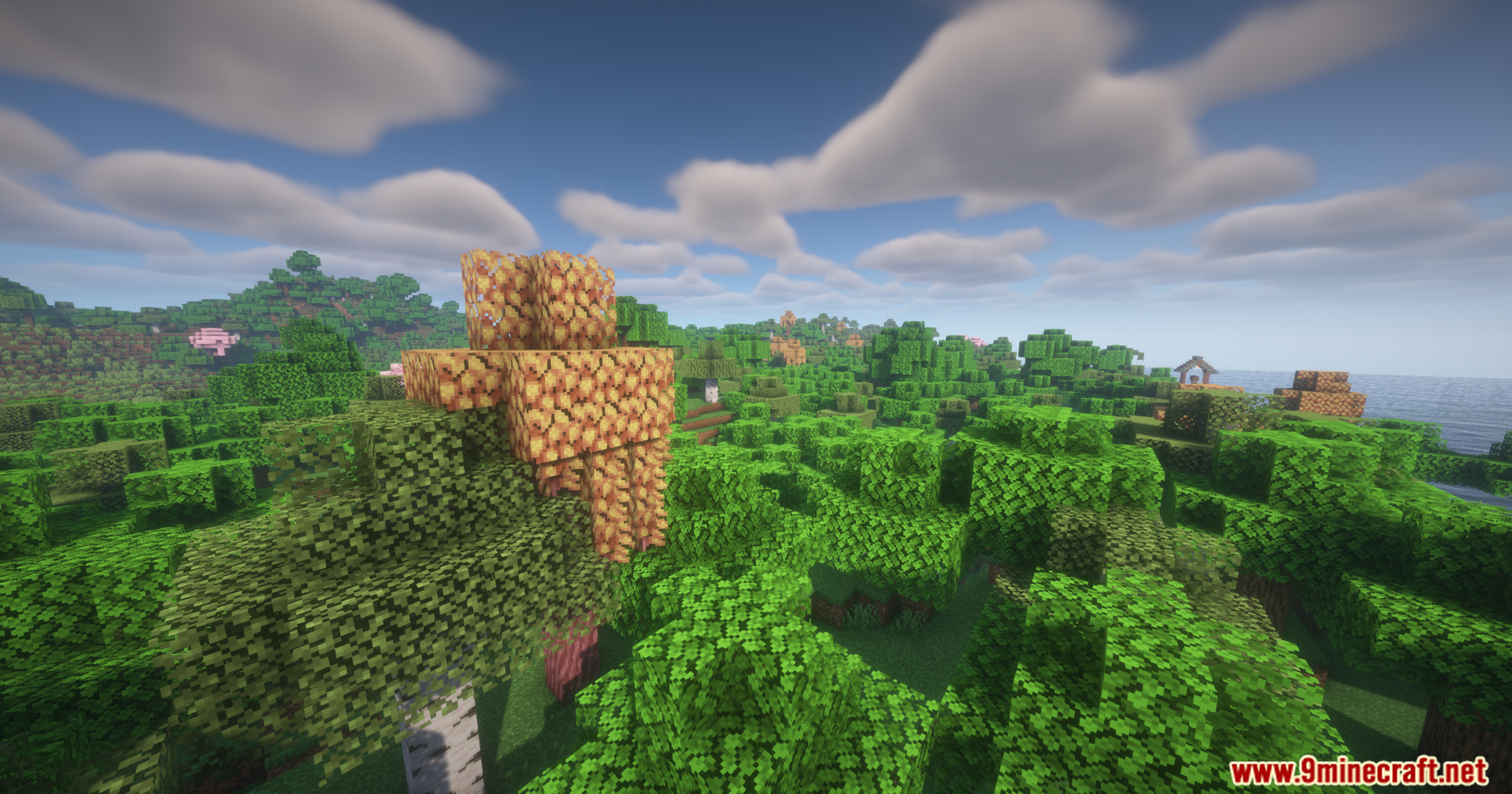Confluence Music Mod Screenshot 2 Beautiful Minecraft landscape with green trees and yellow leaves under blue sky