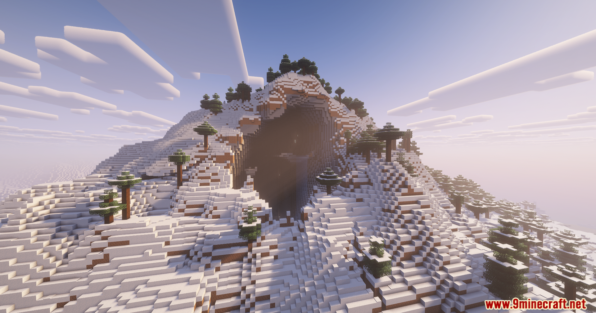 Contour Shaders Screenshot 8 A massive snow covered mountain featuring a large cave entrance under soft sunlight