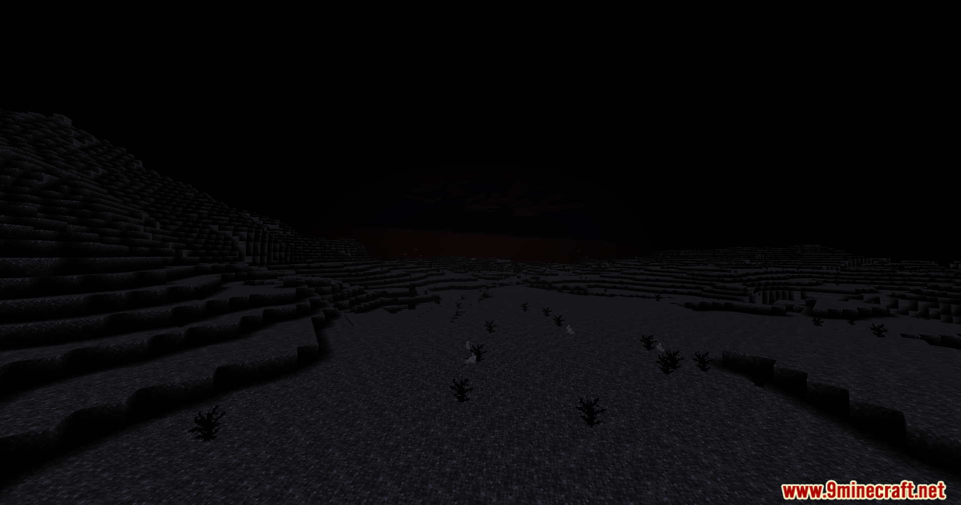 Dark hills and plains in Minecraft with a faint red horizon glow