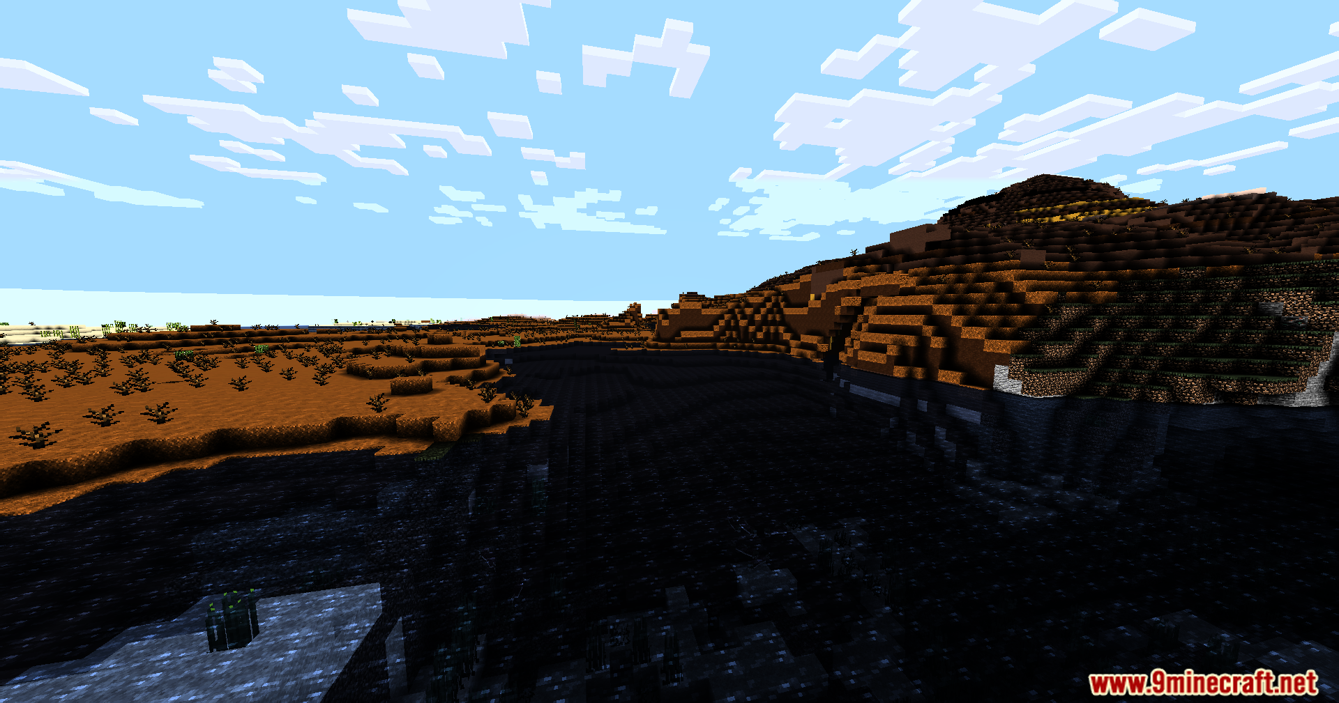 Total darkness covering the ground in a Minecraft world under bright clouds