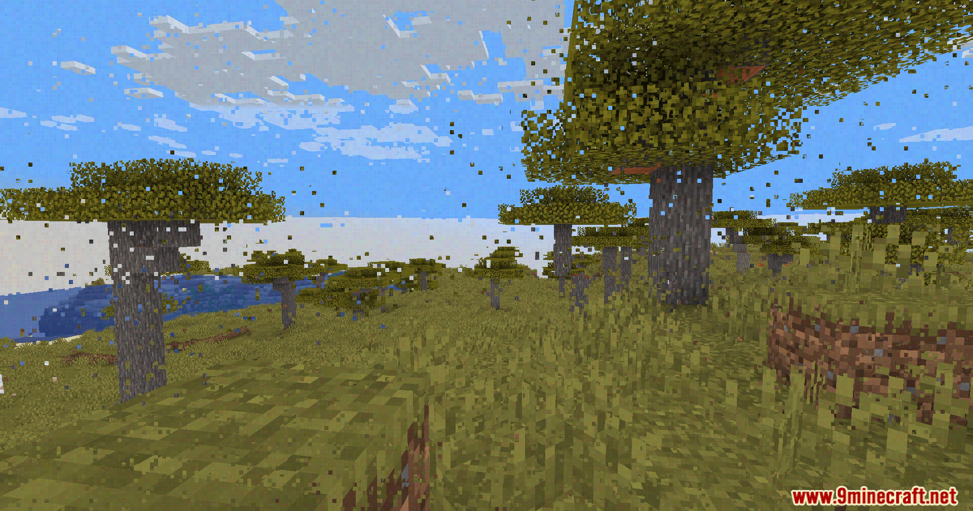 Pixelated glitches create a broken video effect over a Minecraft savanna landscape
