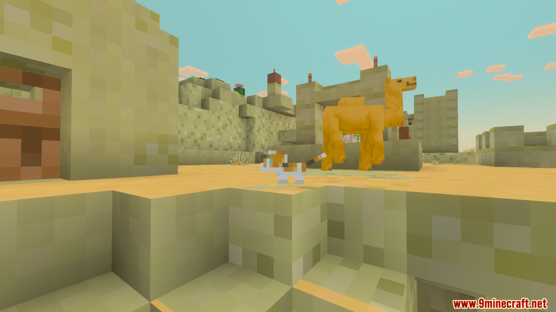 A desert village with a camel and a cat using simplified block textures