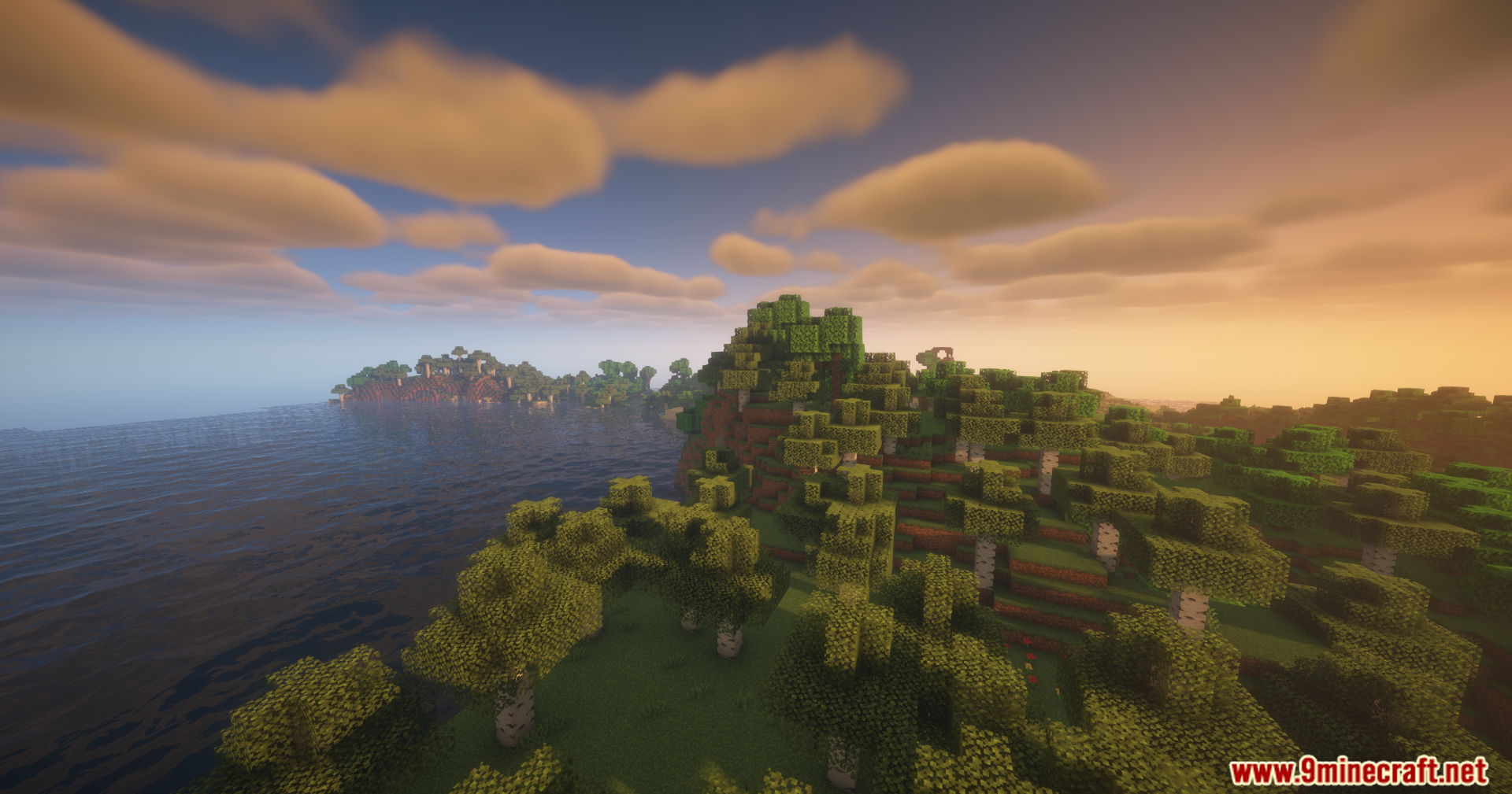 Disable Fog Mod Screenshot 2 Clear view of a Minecraft forest and ocean during a sunset without fog