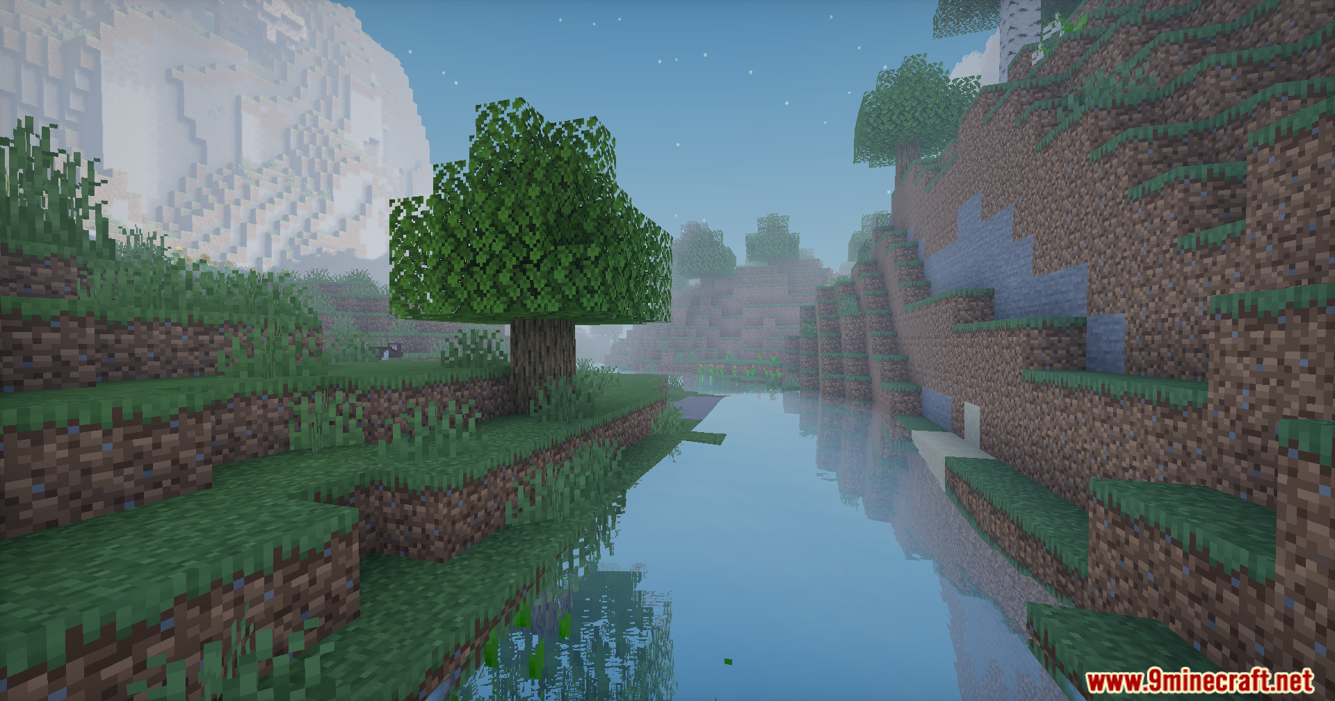Doruk's Shaders Screenshot 2 A peaceful river reflects the sky near a large mountain in Minecraft