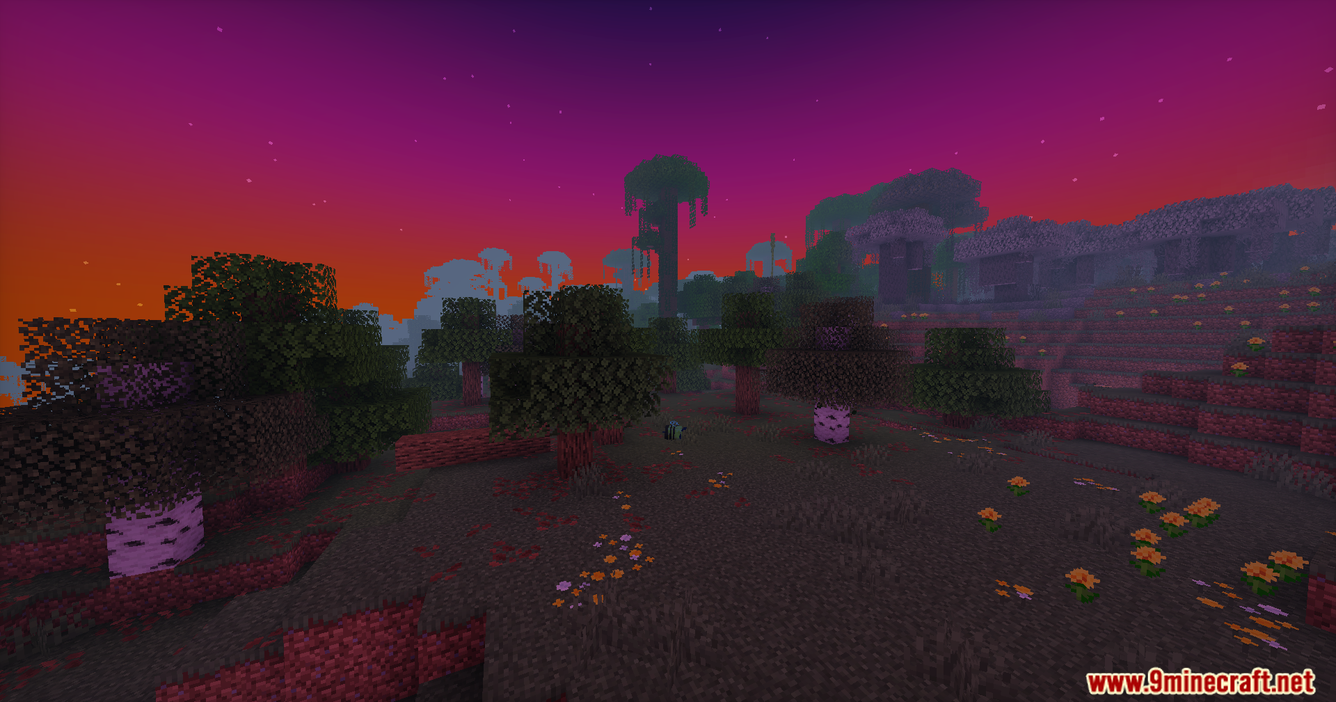 Doruk's Shaders Screenshot 6 A beautiful purple sunset glows over a forest landscape with scattered flowers