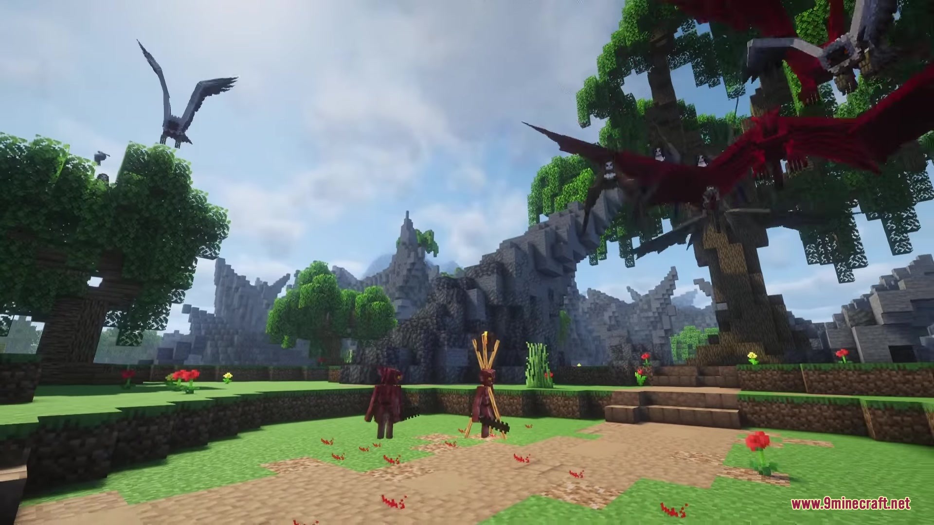 Red harpies fly above a field while goblins stand on the ground